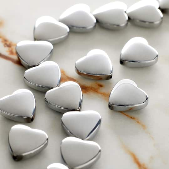 12 Pack: Silver Hematite Heart Beads, 10mm by Bead Landing™